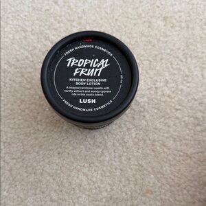 Lush Tropical Fruit Body Lotion in Black Jar